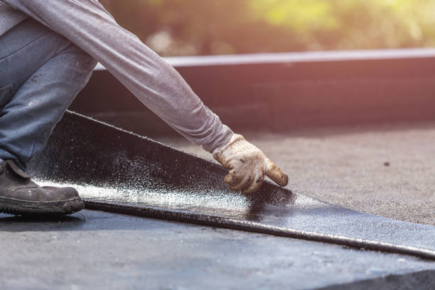 Professional Emergency Waterproofing technician working in Riverside, MI